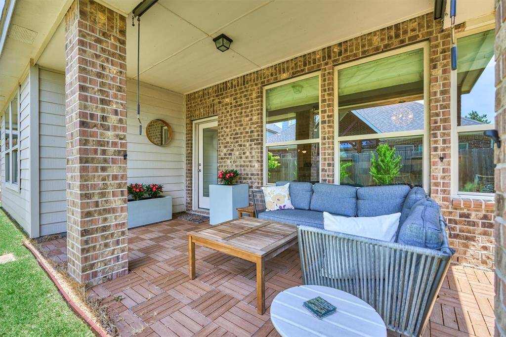 Ample space to grill or relax outdoors on this spacious covered patio!