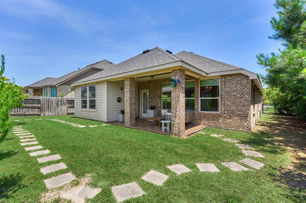 Rear + side yards wrap this Highland Homes gem on cul-de-sac lot!