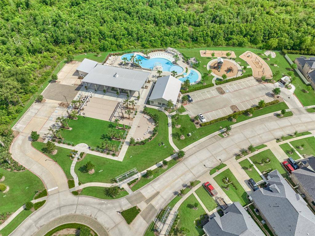 Nearby HOA amenity center features resort style pool, splash pad, and playground.