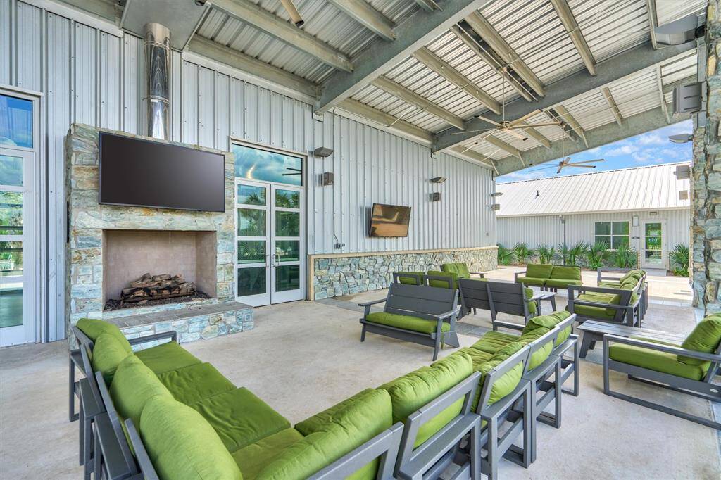 With retractable shade panels, cozy fireplace and event lawn, the community center offers a welcoming place for neighbors to gather!