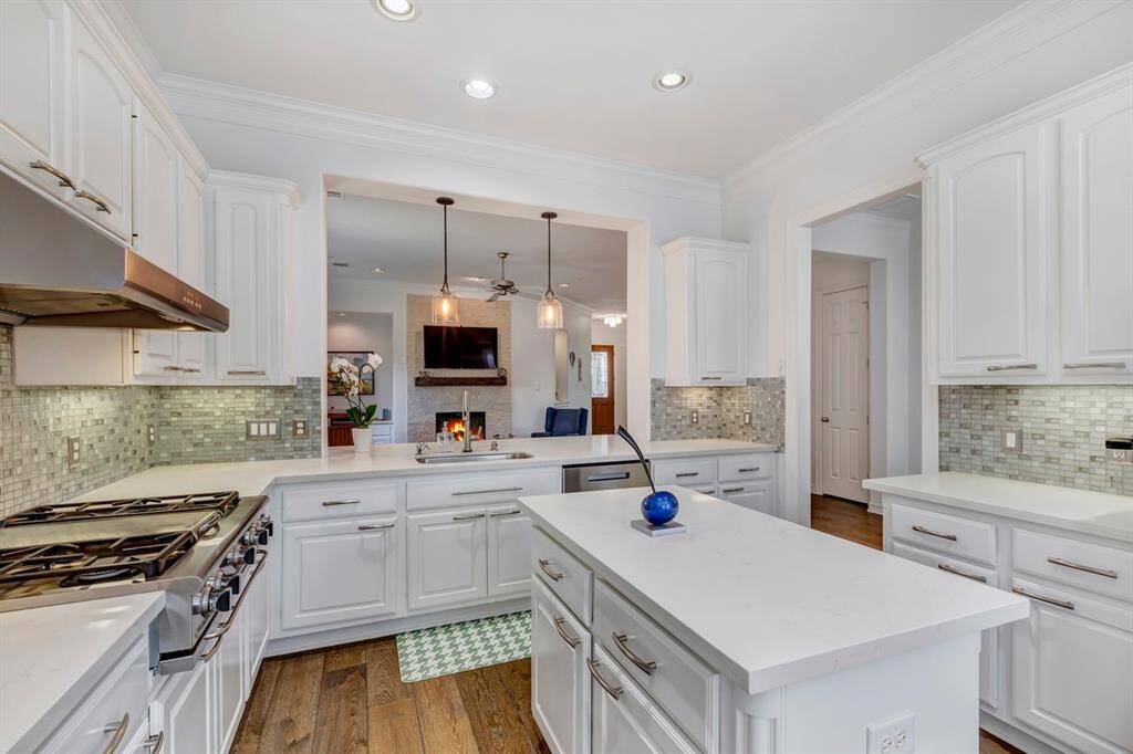 Kitchen features high end SS appliances.