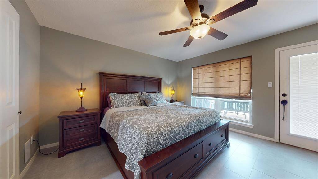 Spacious downstairs primary suite with stunning water views.