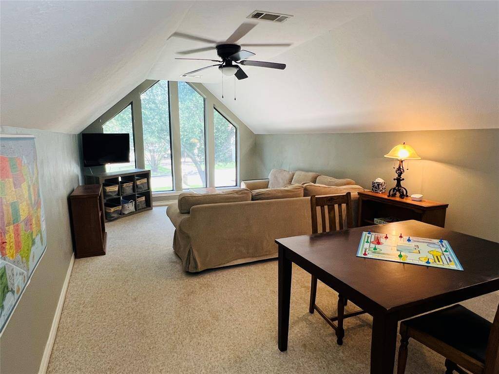 Spacious room above the garage, accessible via a second staircase. Ideal for an office, teen retreat, or convert into a large bedroom.