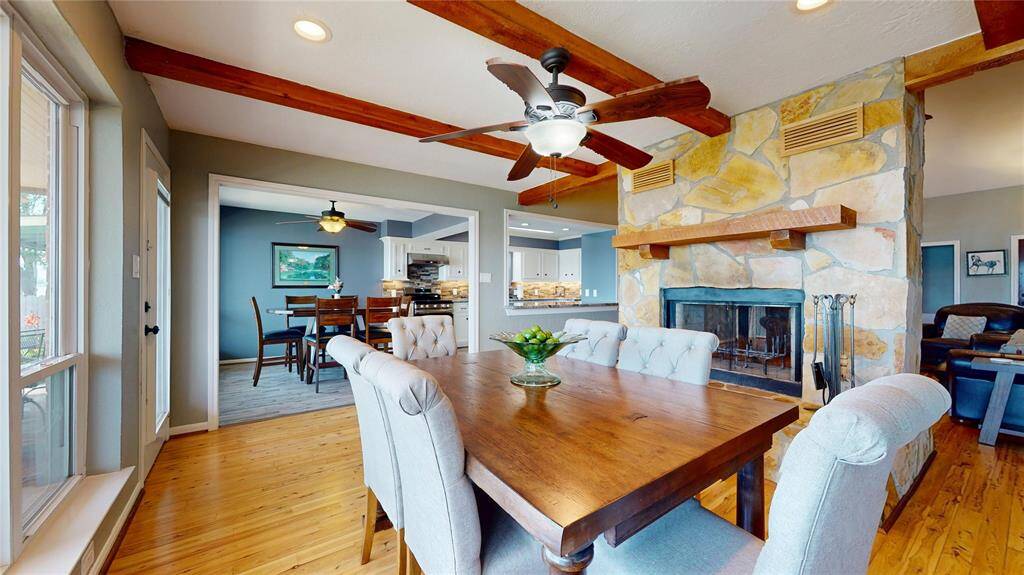 Enjoy stunning views and cozy dining by the double-sided fireplace.