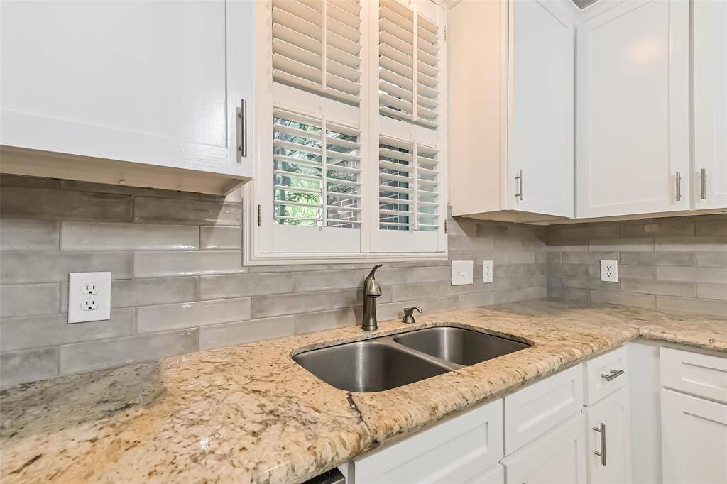 A closer look at the recent updated tile backsplash and double basin sink.