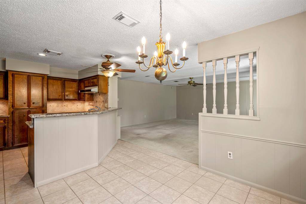 Cozy eat-in kitchen area with a large window that brings in tons of natural light—perfect spot for your morning coffee.