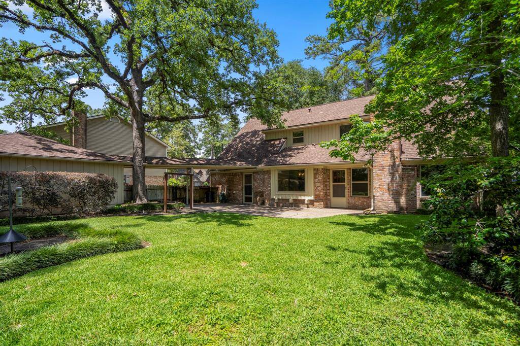 Step into your own private escape with mature trees, manicured landscaping, an 8-foot privacy fence, and a full-yard sprinkler system to keep things green and gorgeous.