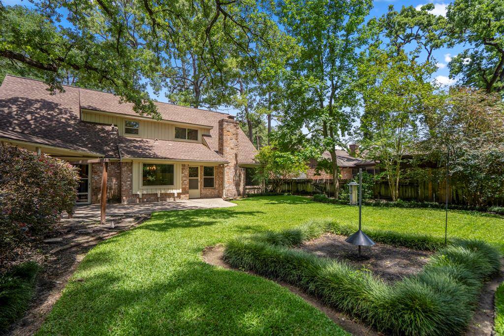 Step into your own private escape with mature trees, manicured landscaping, an 8-foot privacy fence, and a full-yard sprinkler system to keep things green and gorgeous.