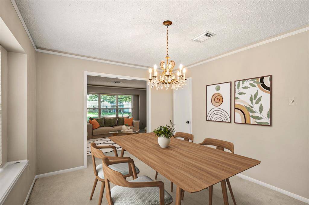 Bright and open dining space with large windows and a convenient flow right into the kitchen. - VIRTUALLY STAGED
