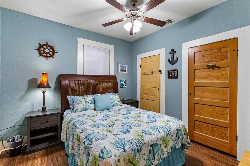 1st bedroom. Beautiful wood doors