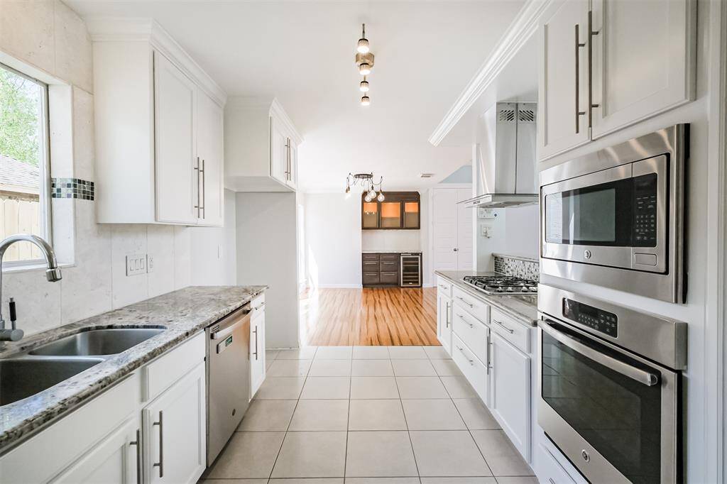 There is also a built-in SS microwave and electric single oven.