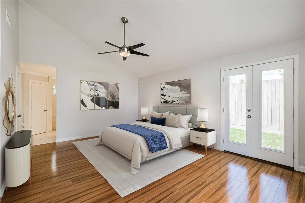 A staged photo of the primary bedroom.