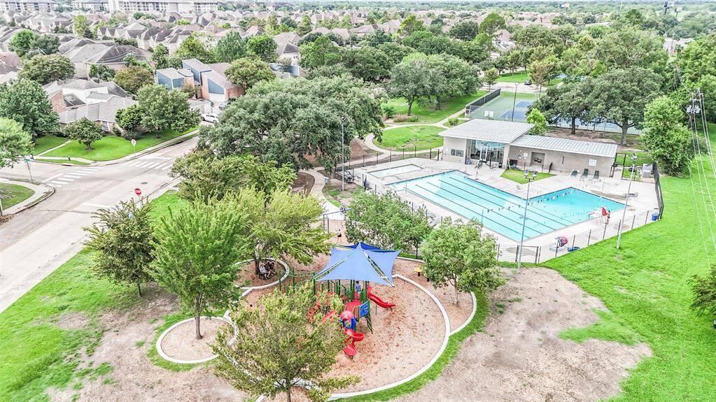 The playground is next to a big field where you can picnic, kick a soccer ball around, play tag, etc.
