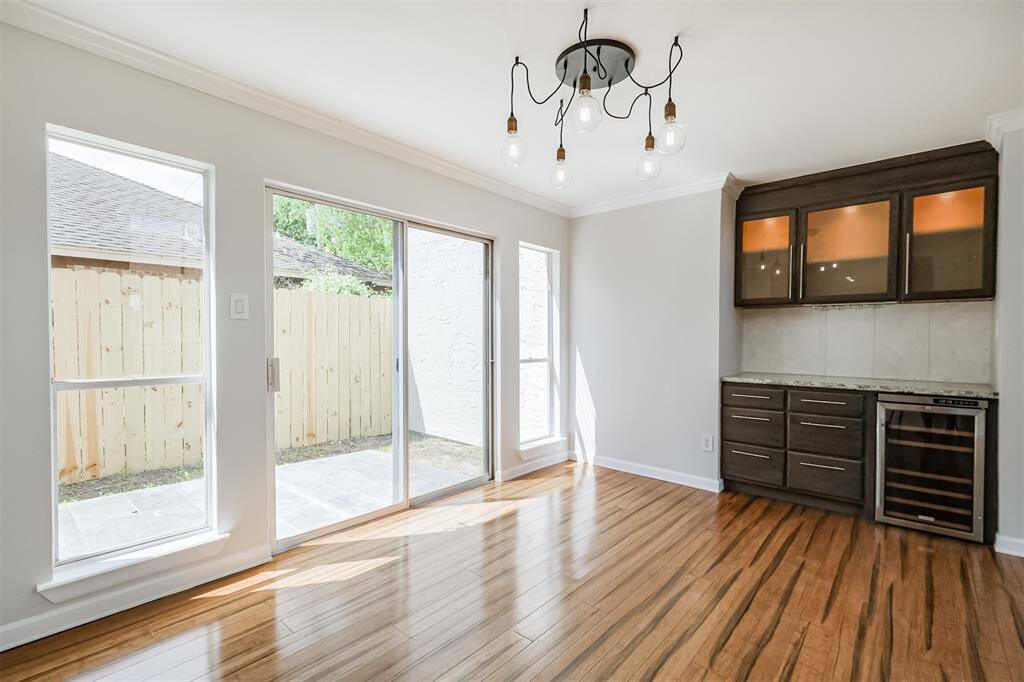 The dining room has a sliding glass door to access the side patio.