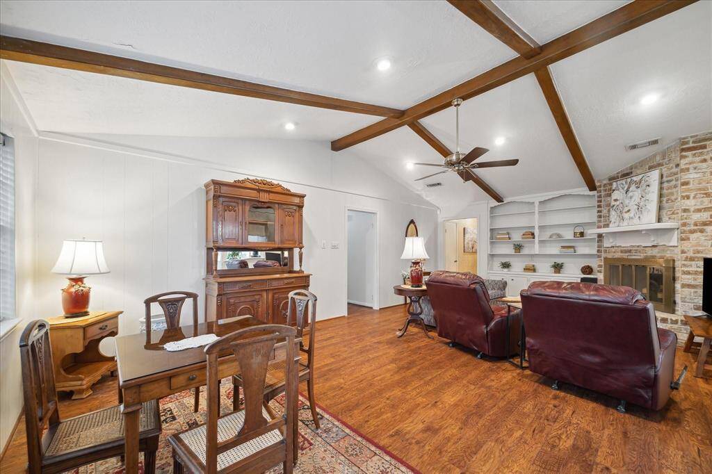 Just off the Family Room is the hallway leading to the Primary Suite and Secondary Bedrooms.