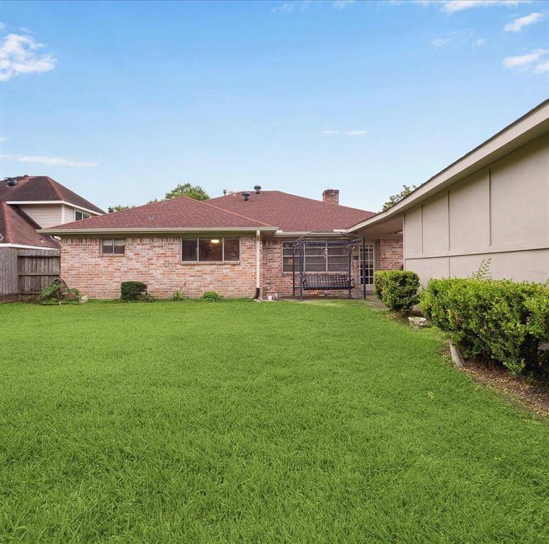 Large Backyard area is perfect for a play place or room to entertain.