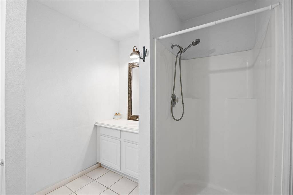 Sleek stand-up shower for a modern touch.