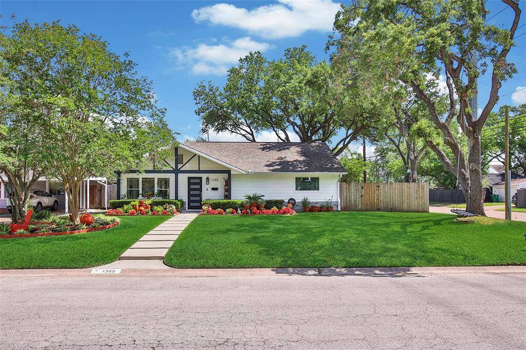 A 4-bed,2-bath home with a 1/1 garage appartment.