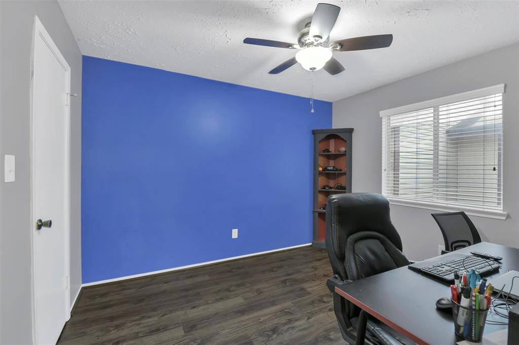 Beautiful blue accent wall in third bedroom/office