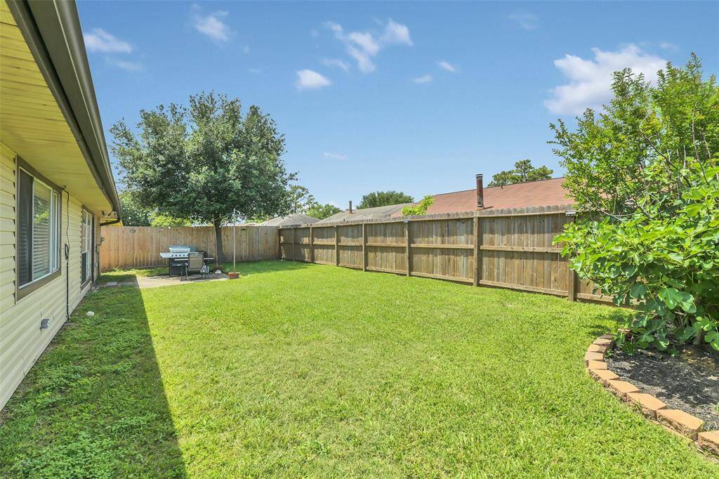 Fully fenced in backyard