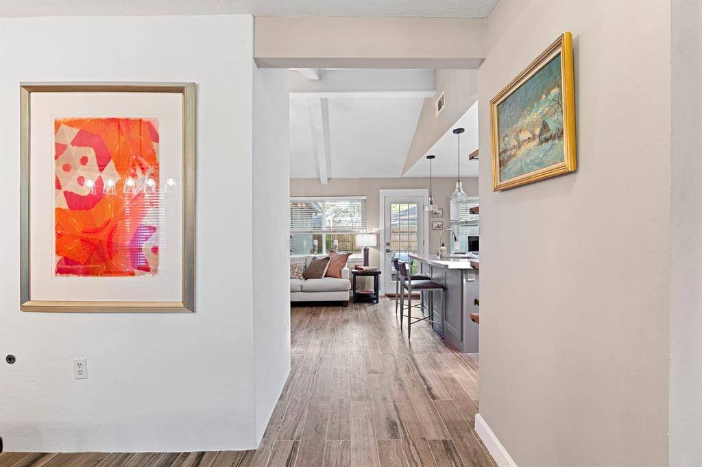 New luxury vinyl plank flooring adds a modern touch of elegance and durability throughout the home.