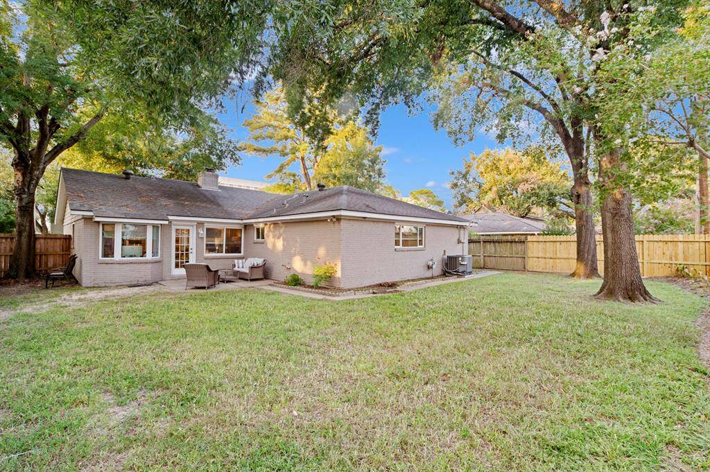 Large, well-maintained backyard providing ample space for outdoor activities and relaxation