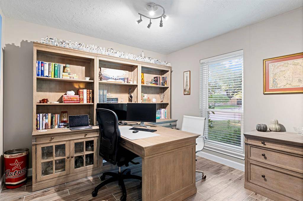 Dedicated office space just off the front entry, offering both privacy and convenience for work-from-home needs.