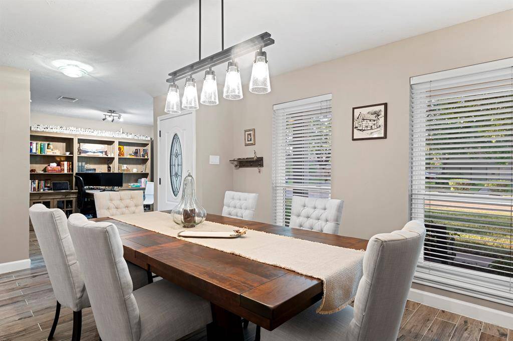 Abundant natural light floods the space, creating a warm and inviting atmosphere throughout the home.