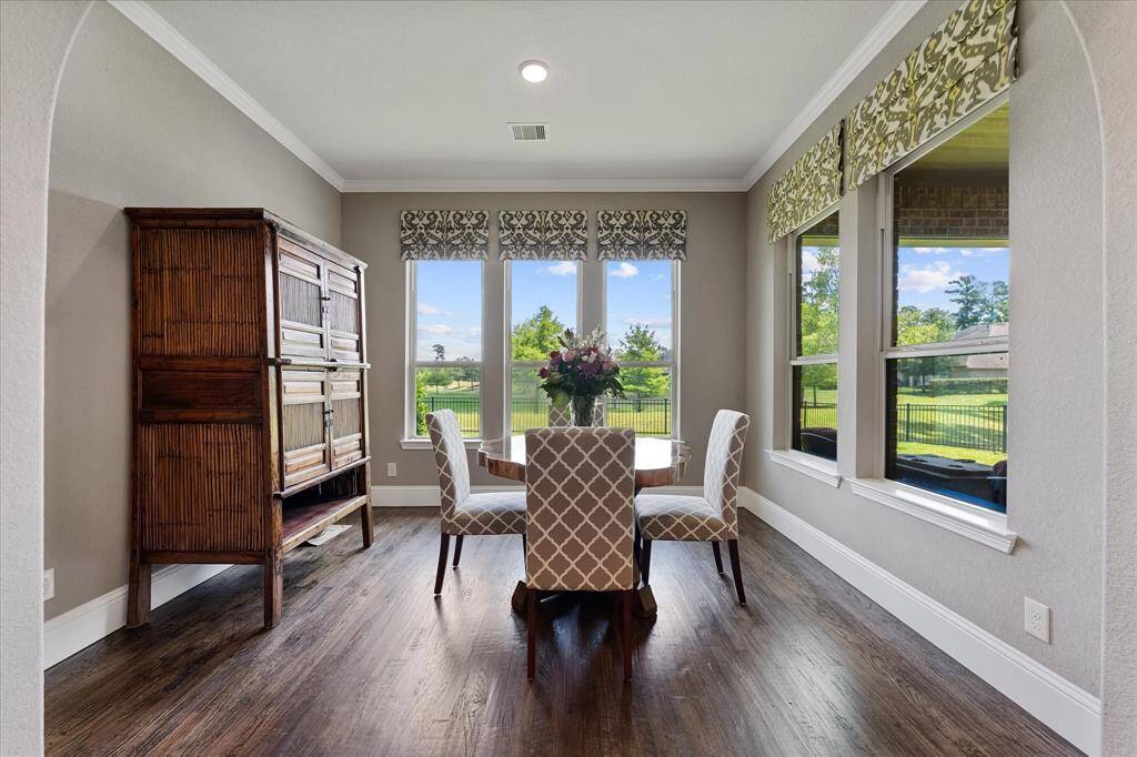 Breakfast room with views to the backyard and covered patio