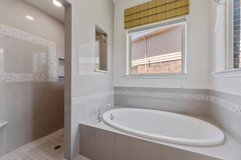 Deep soaking tub and spacious walk-in shower
