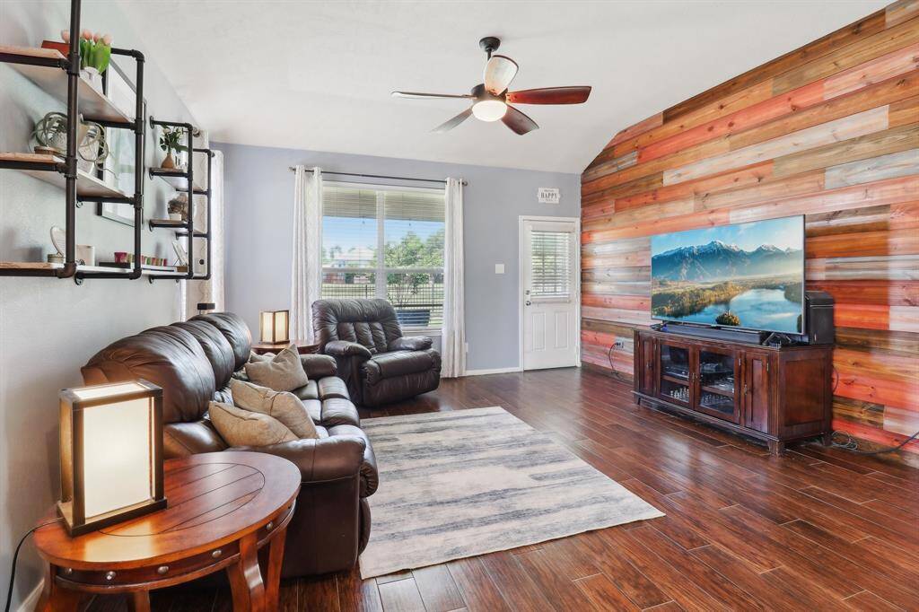 Large windows out to the backyard provide natural light.