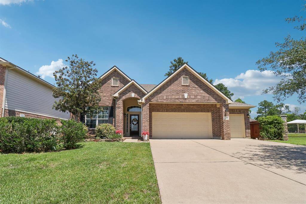 Featuring 3 car garage and extra wide driveway