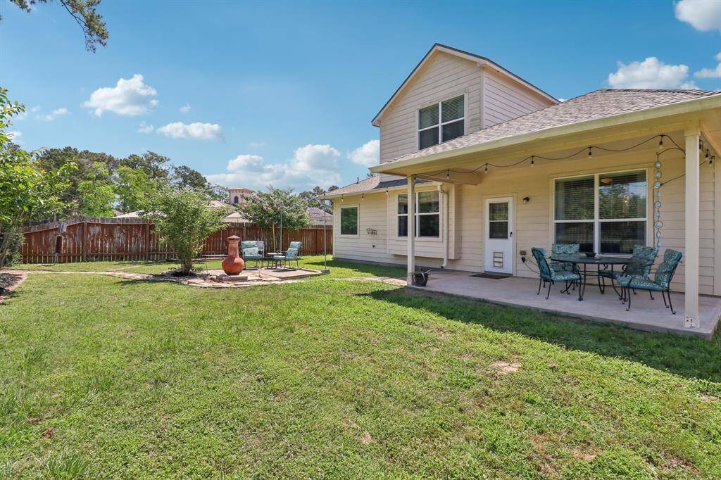 Covered patio is the perfect spot to entertain