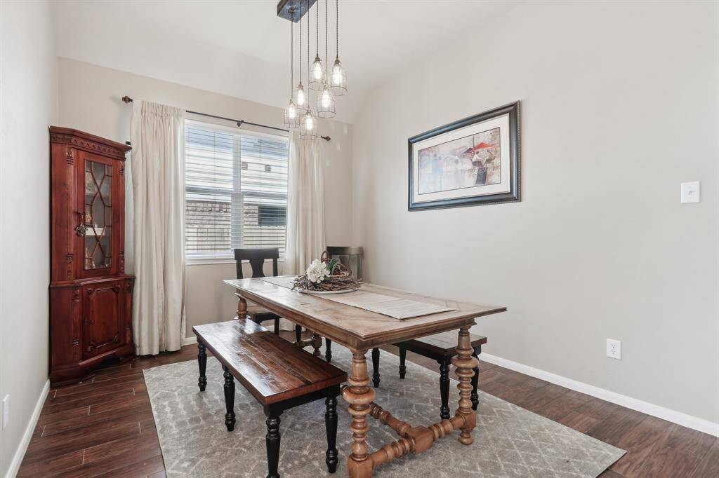 Formal dining with custom chandelier