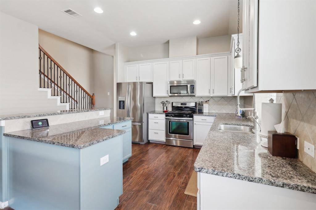 Granite counter tops and stainless steel appliances provide both style and function!