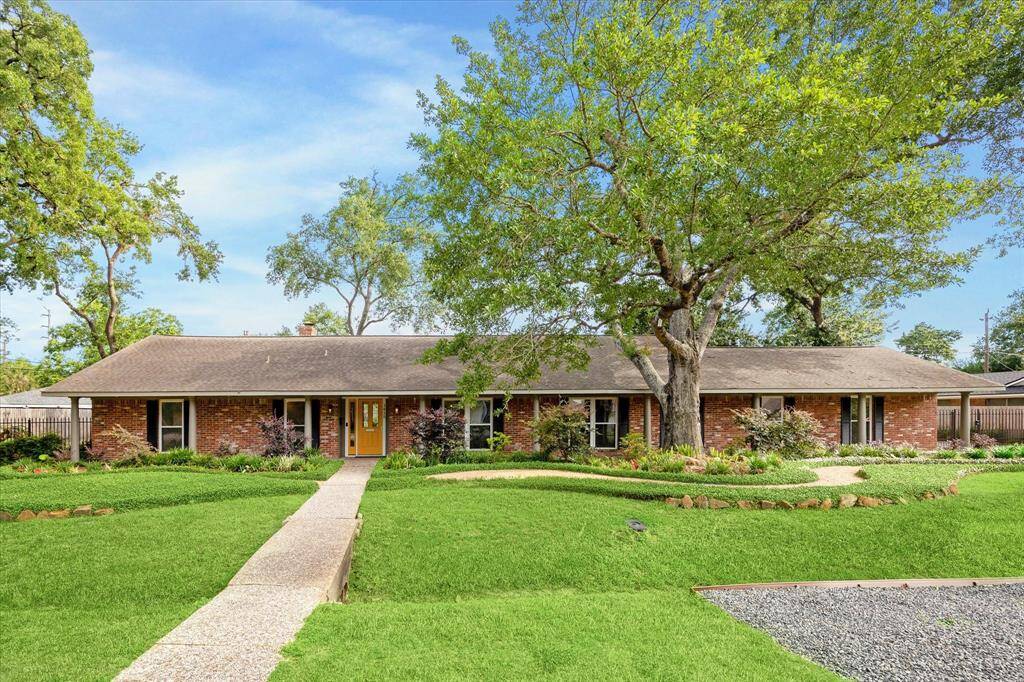 Welcome to 1415 Lehman! This sprawling 3/4 bedroom, 3-bath ranch-style home sits on two generously sized lots with mature landscaping and a sparkling pool!