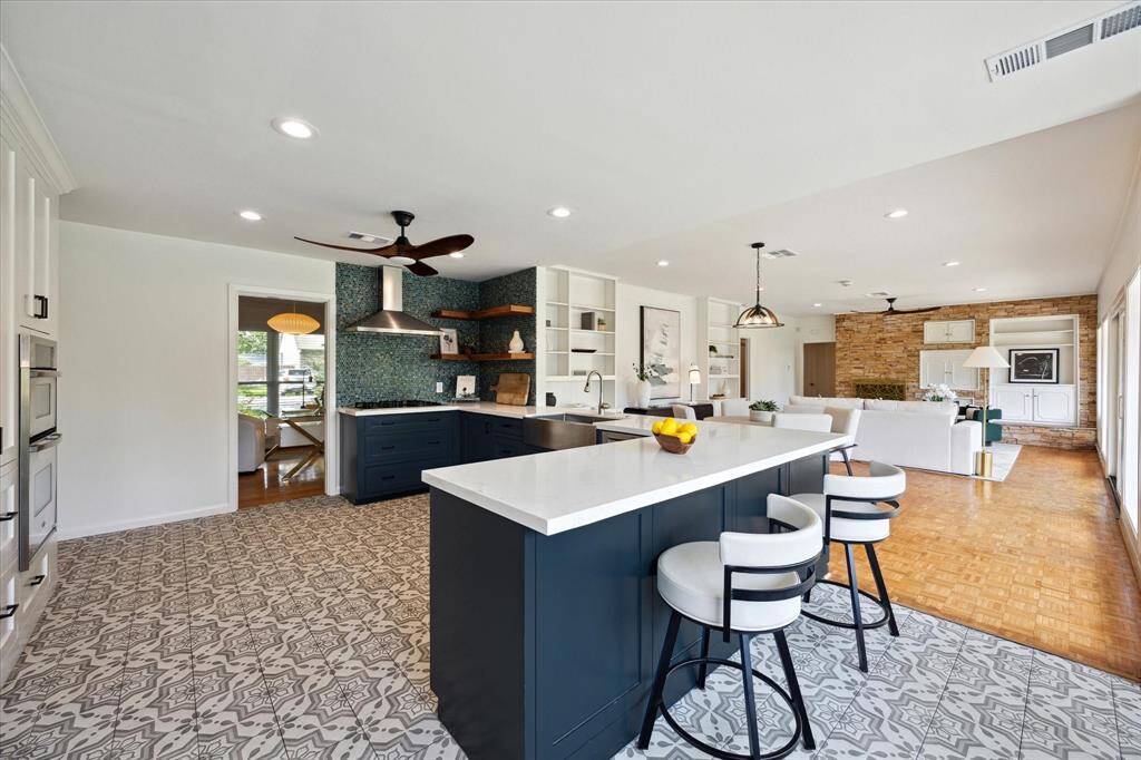The kitchen is open to the breakfast room and living room making it easy to cook while entertaining or keeping an eye on loved ones.