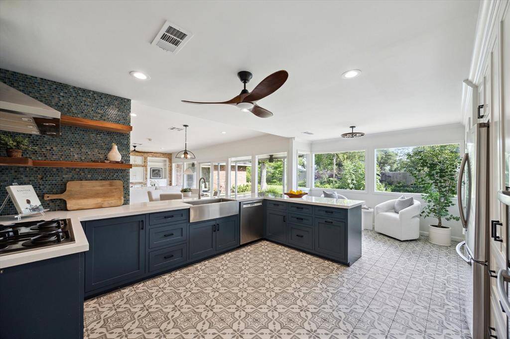 This generous kitchen offers plenty of space to cook, create, and gather.