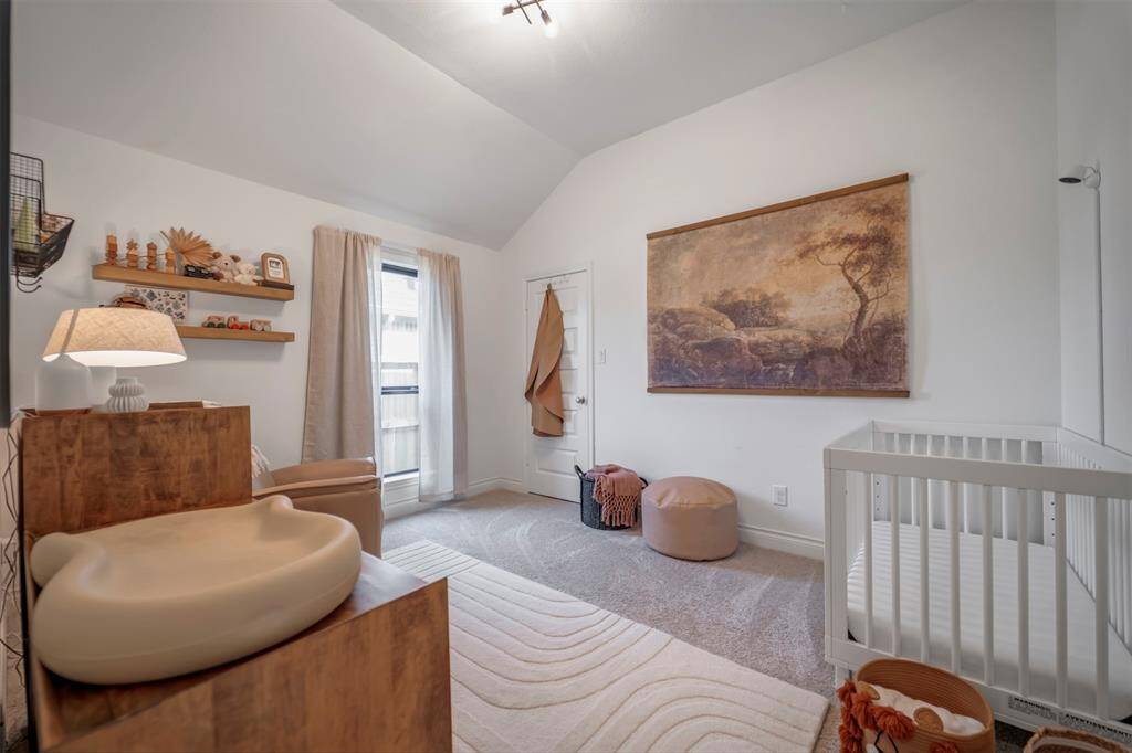 The second bedroom suite includes a full bath in the hallway for easy access.