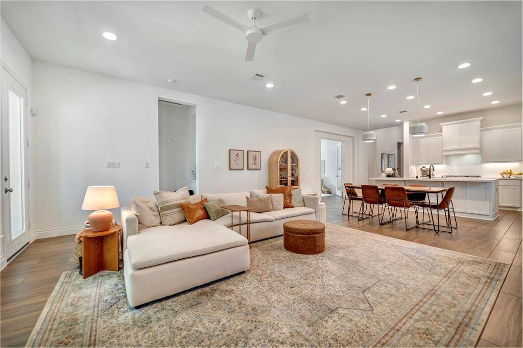 The family room flows seamlessly into the dining room and kitchen.