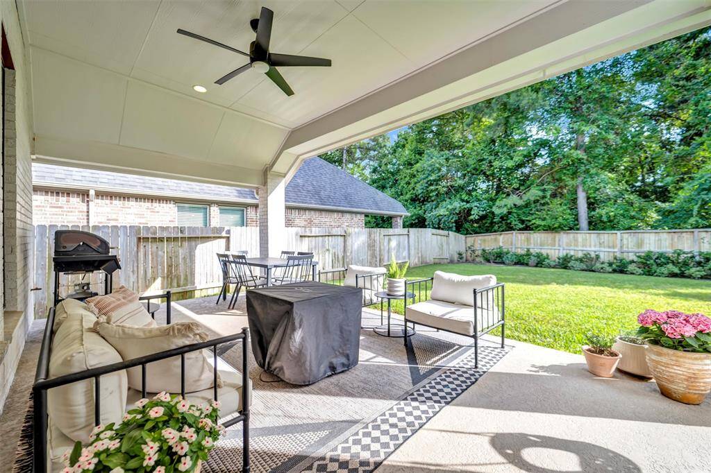 The spacious covered patio is ideal for outdoor entertaining.