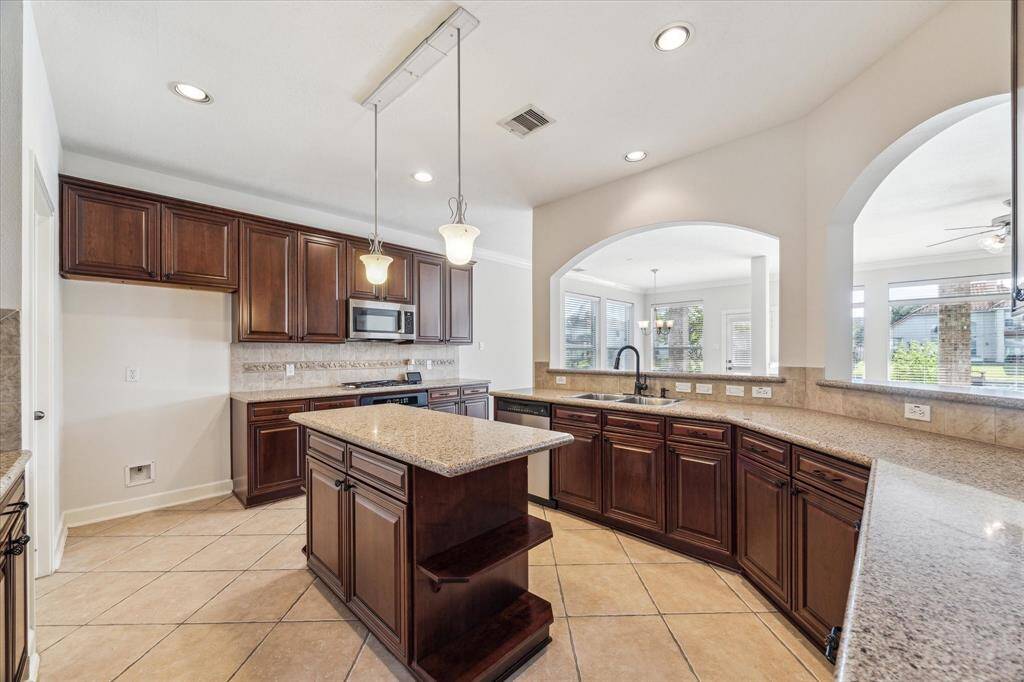 The sellers extended and enlarged the kitchen floorplan and upgraded the cabinetry.