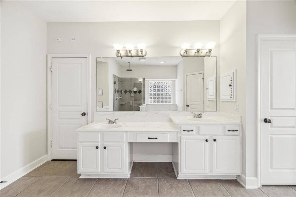 Vanity with two sinks.