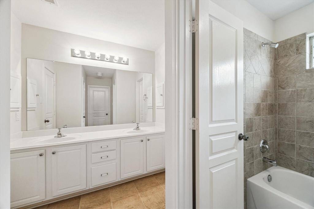 This is the third full bath located on the second floor. This one is shared with two bedrooms and guests.