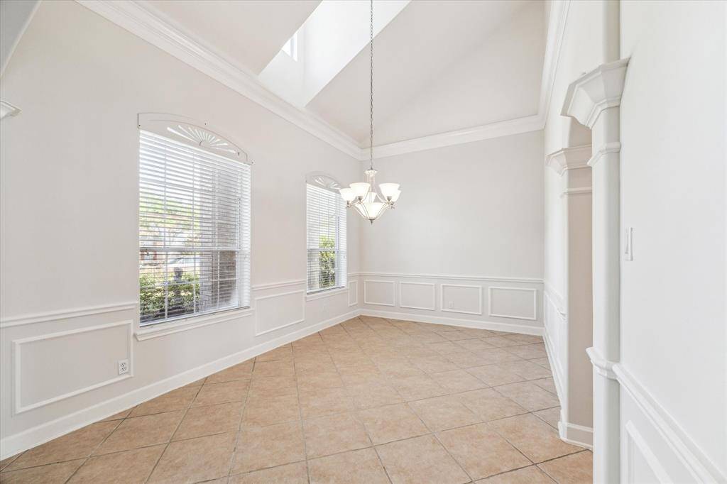 The dining room with plenty of room for a long dining table and plenty of seating.