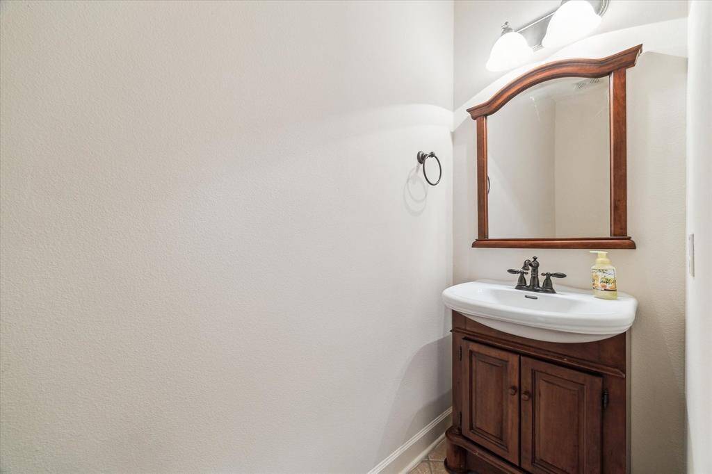 Powder room next to the office.