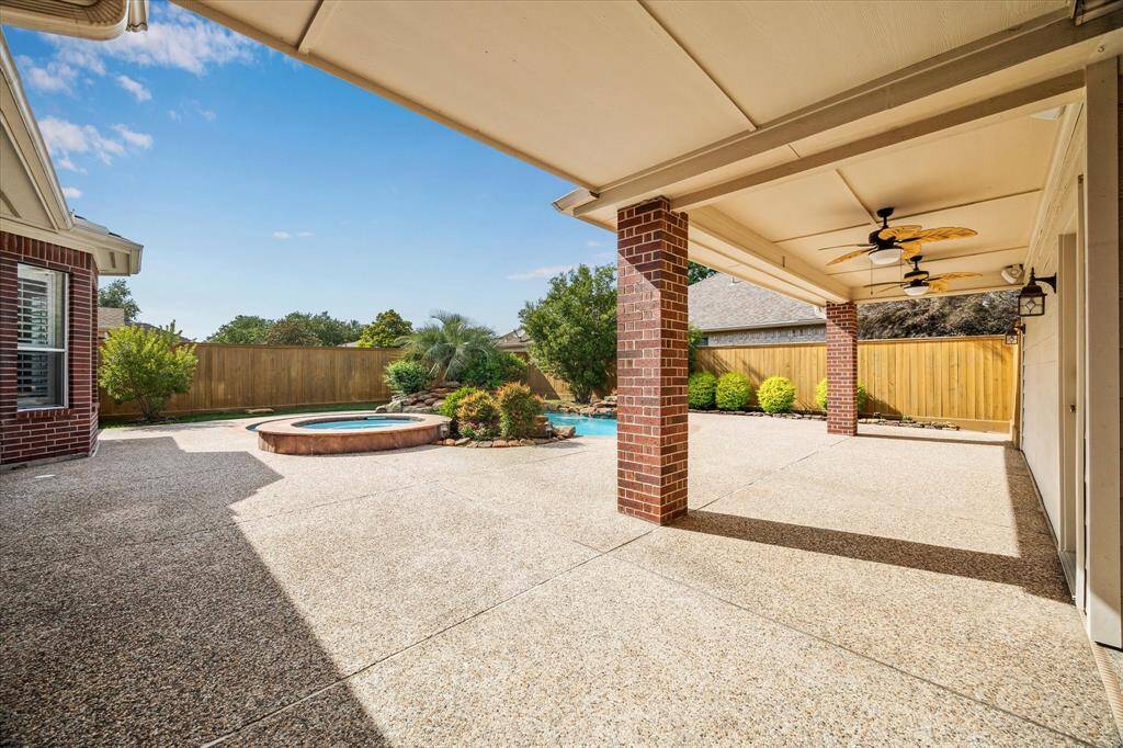 So much space to create your outdoor entertainment area, the second garage off of the pool area allows for so many possibilities