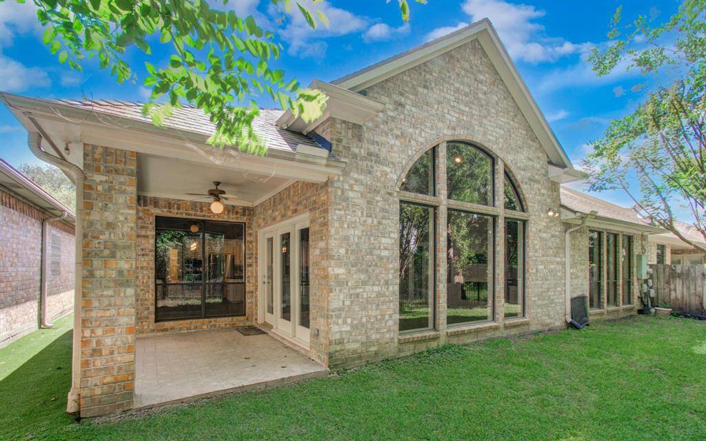 Covered patio perfect for enjoying the scenic backyard