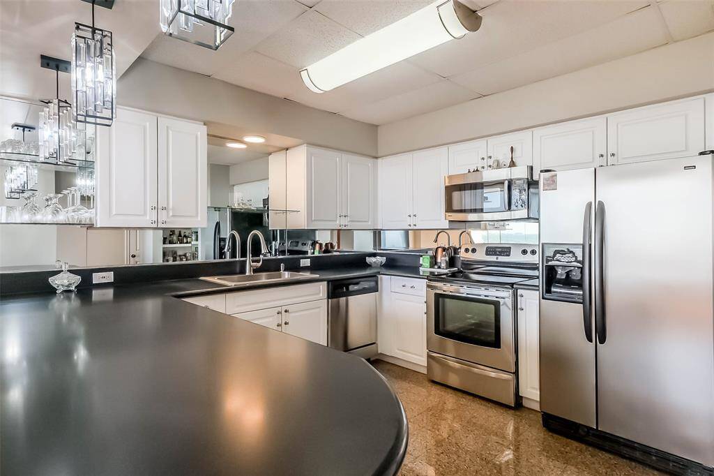 Stainless appliances throughout the nicely updated kitchen.