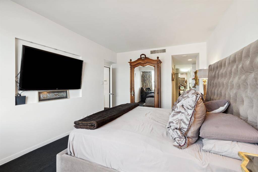 Large walk-in closet and private bathroom.